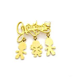 Vintage Danecraft Grandma Brooch, Elegant Gold Tone Script with Kid Charm Dangle